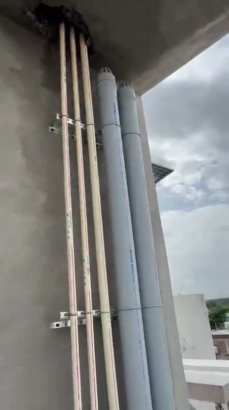 Kothari SWR and UPVC pipes installed on an exterior building wall in Bengaluru